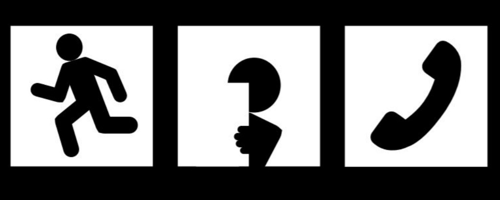 A person running, a person hiding and a telephone handset