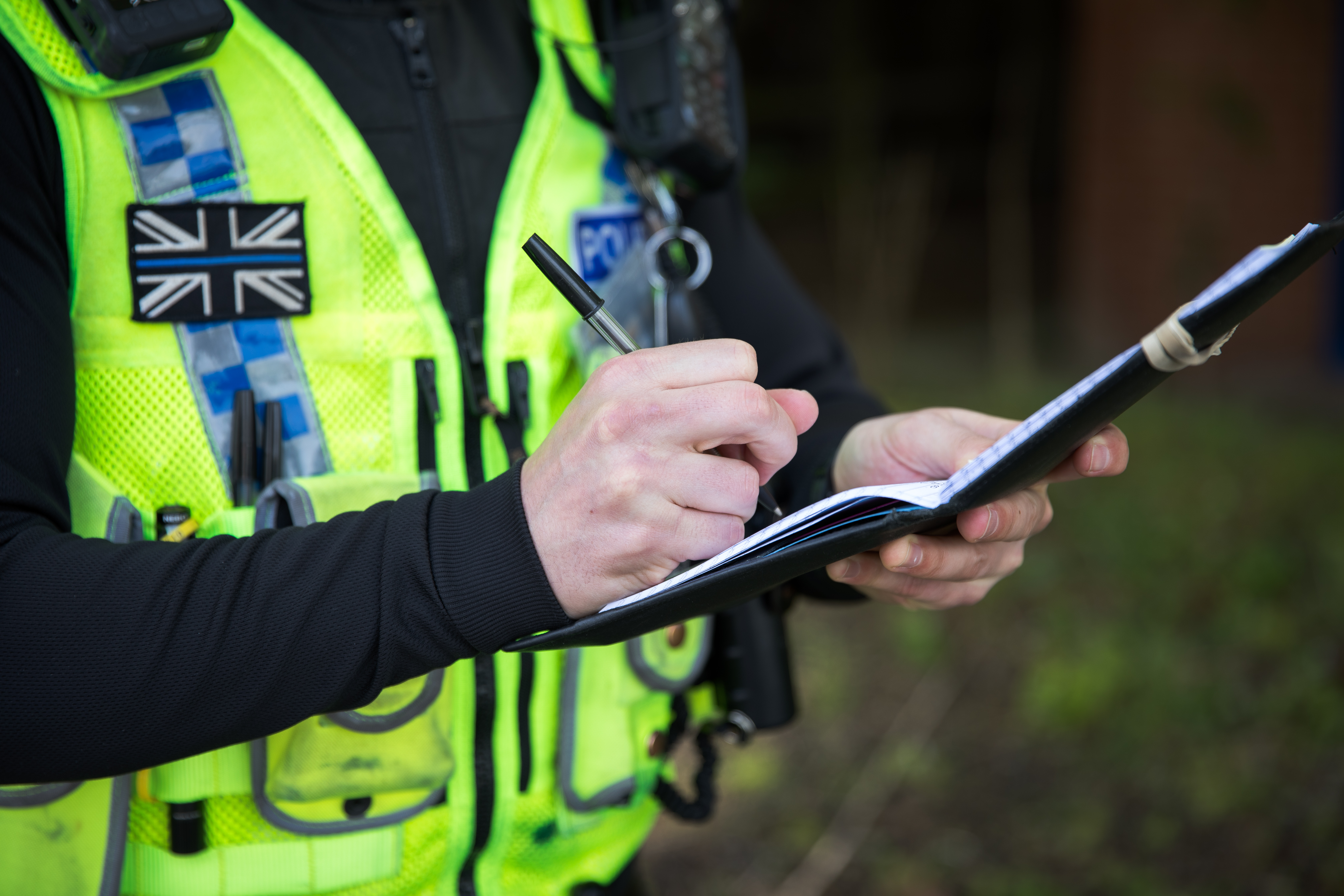 police officer taking notes