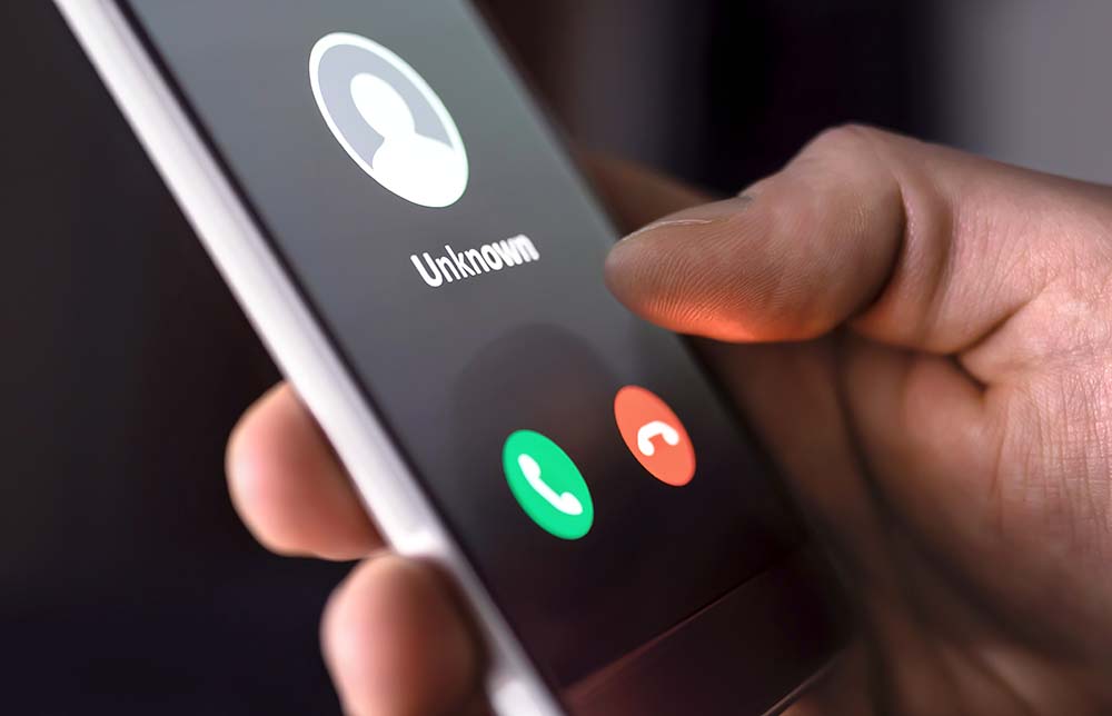 Mobile phone with caller unknown on screen