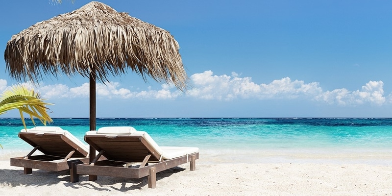 empty sun beds on a beach