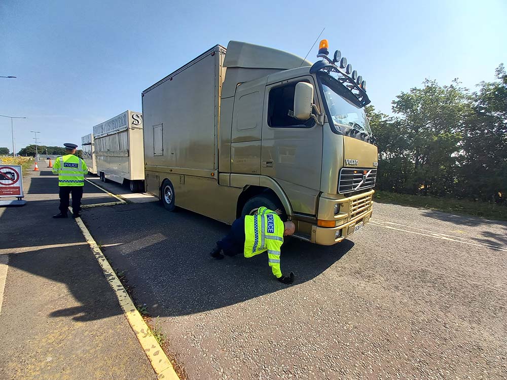 Lorry being checked by police officers