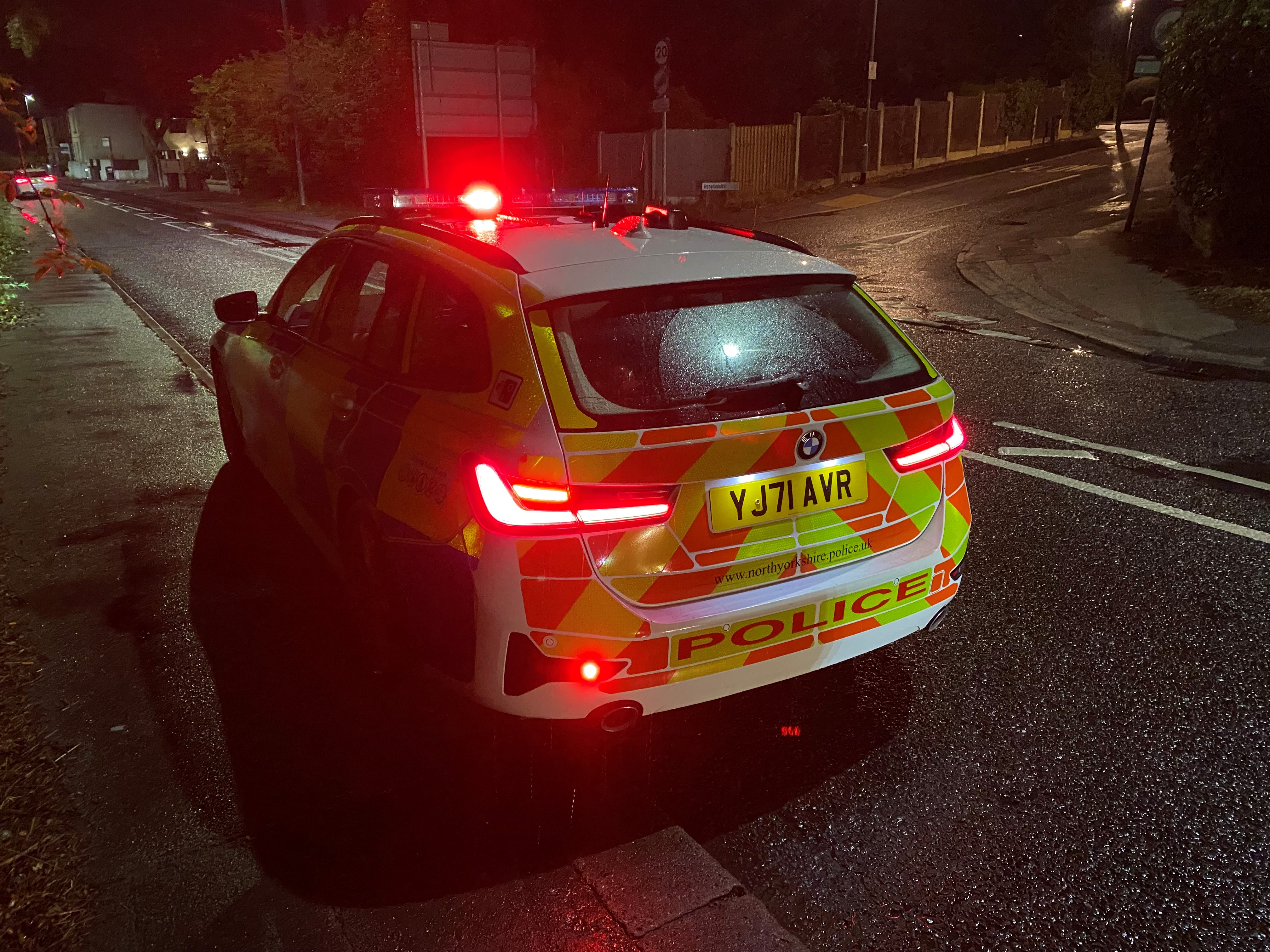 Police car on night patrol