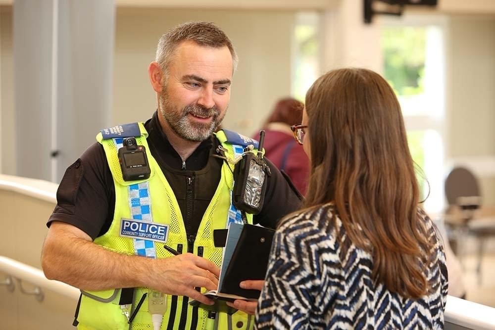 PCSO taking a report