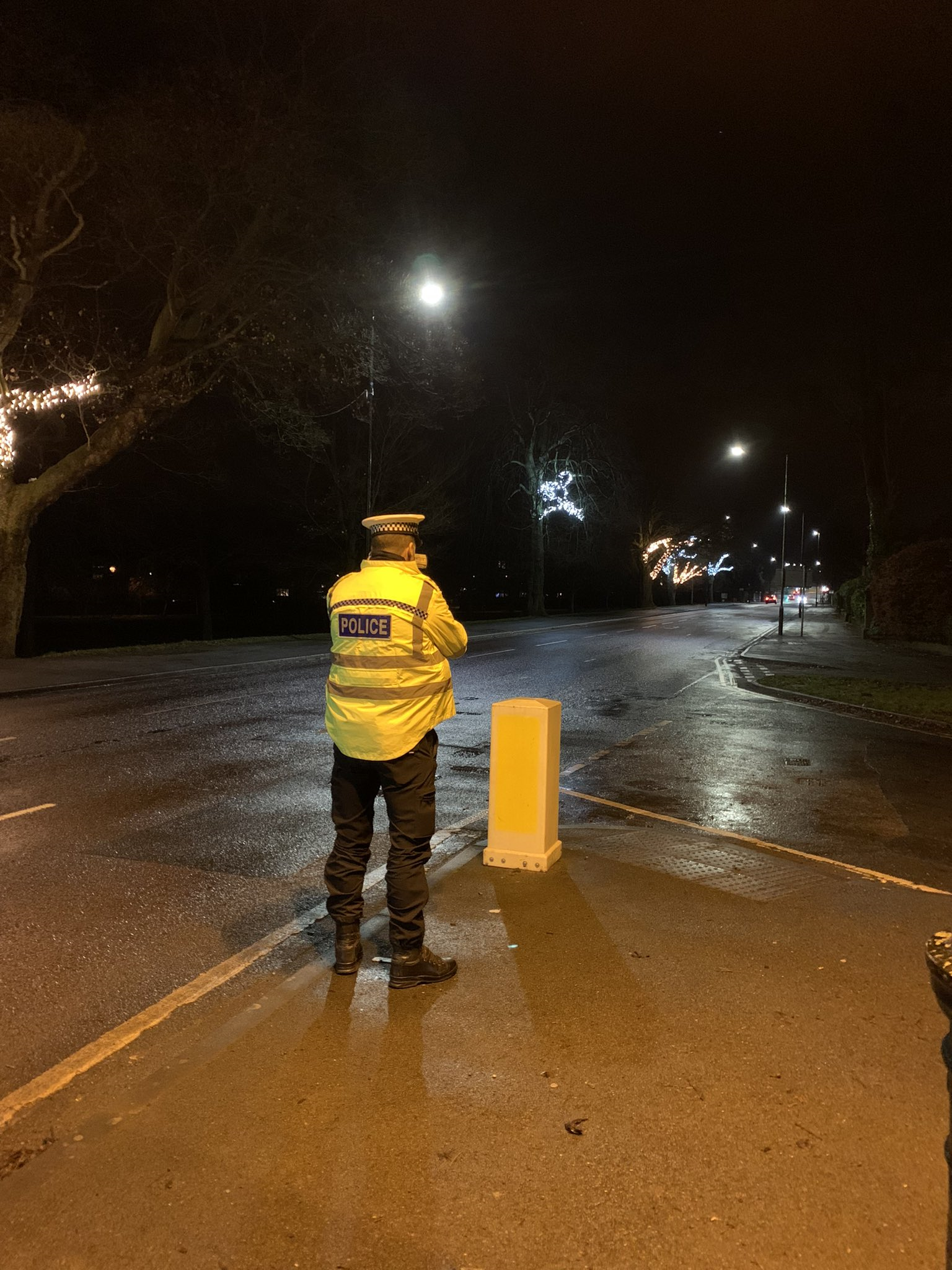police officer on road safety operation at night in Harrogate 