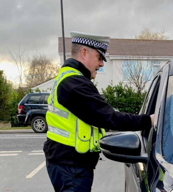 Officer conducting a breath test