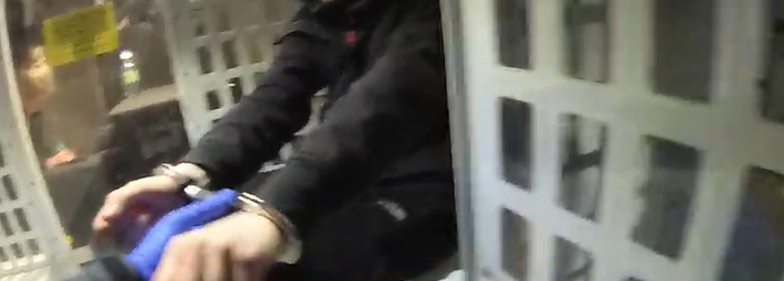 Suspect with handcuffs on