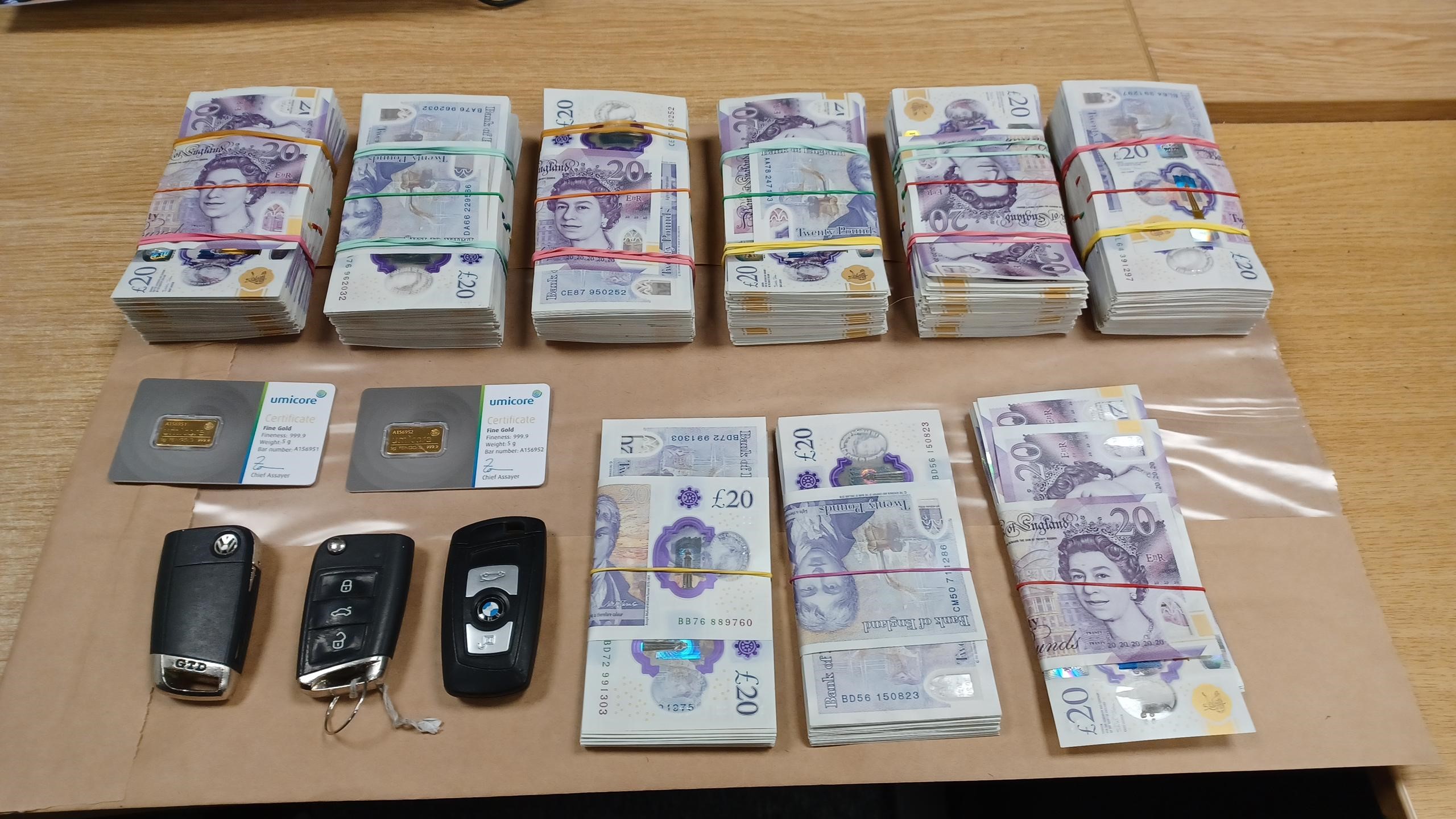 Two arrested following discovery of £60,000 in cash, drugs, and gold bullion bars