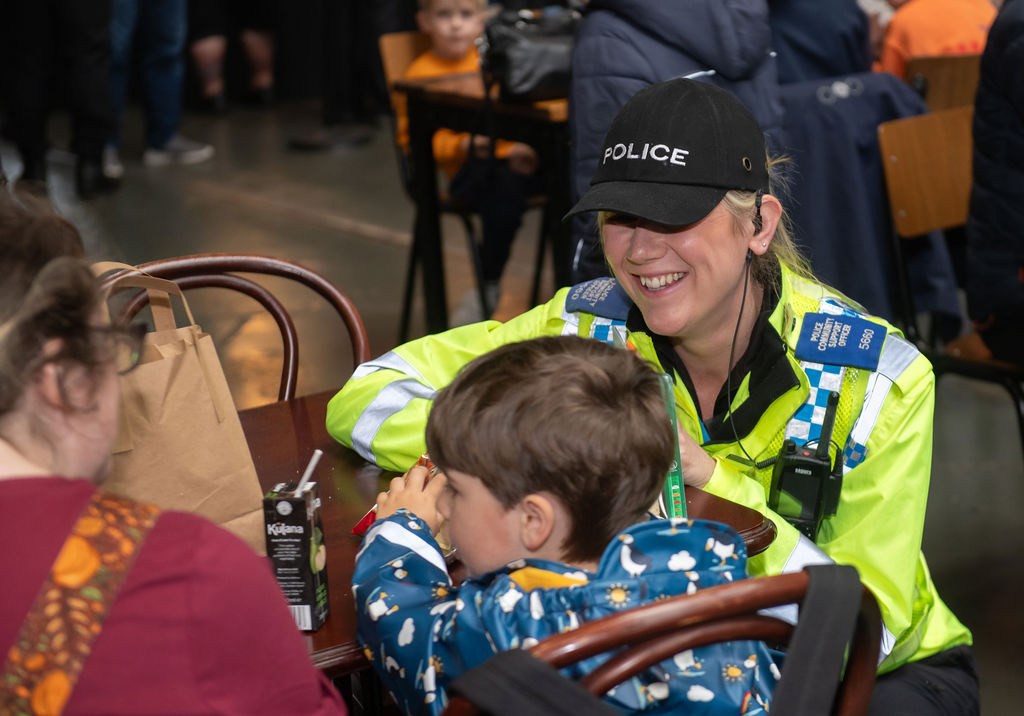 PCSO talking to cafe customers