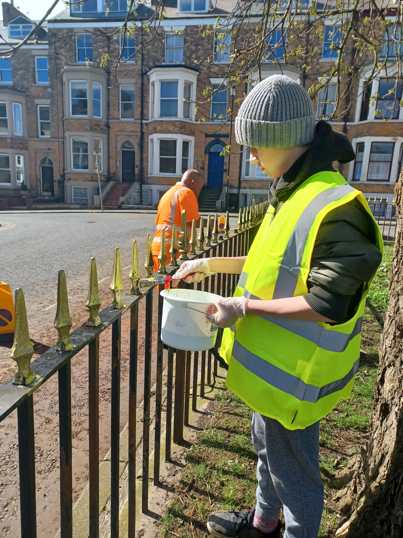Police Cadets painting railings in Scarborough 