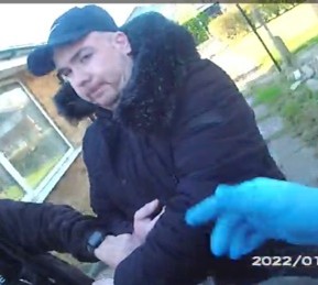 John McEvoy being arrested.jpg