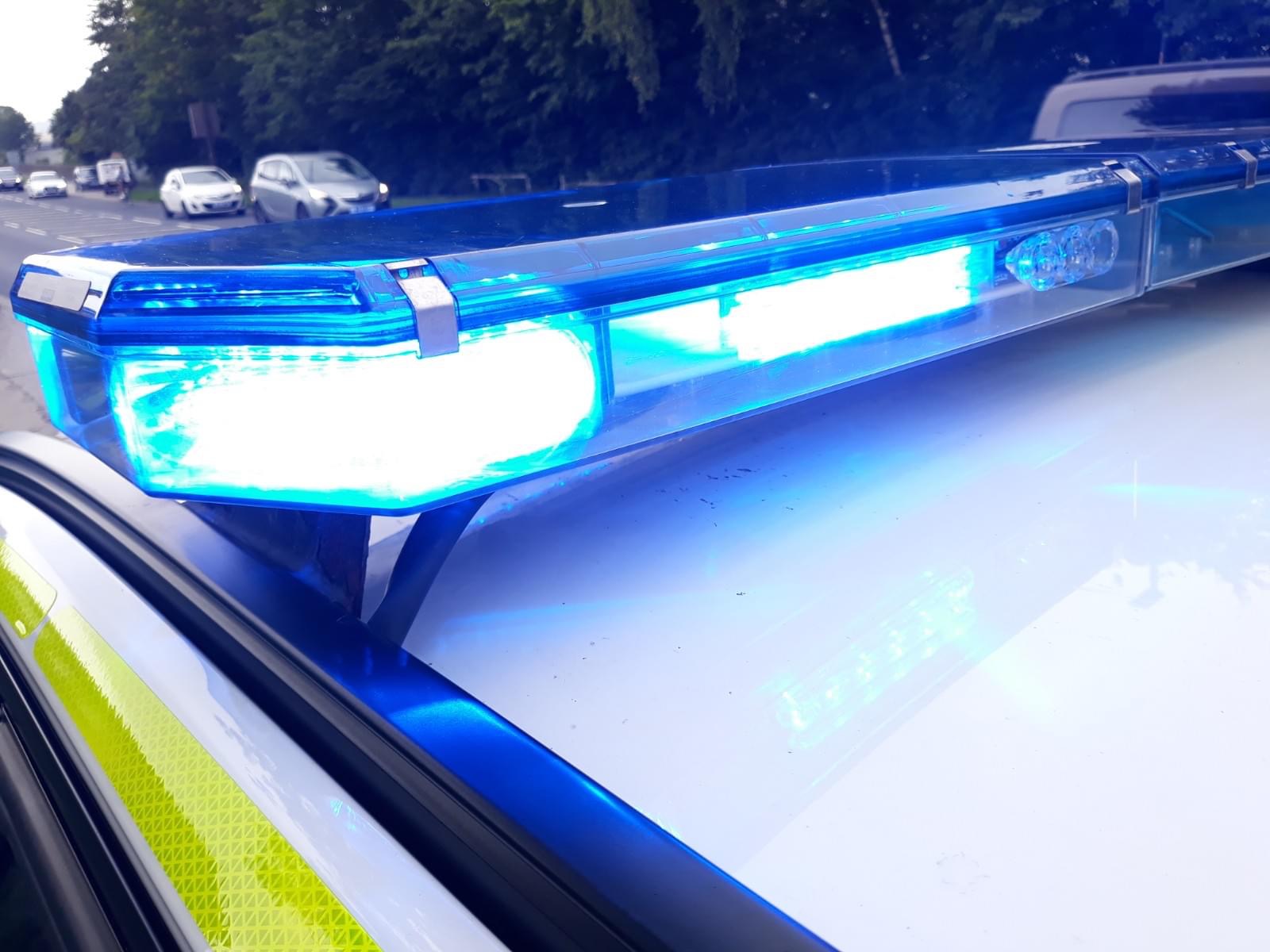 blue lights on roof of police car 