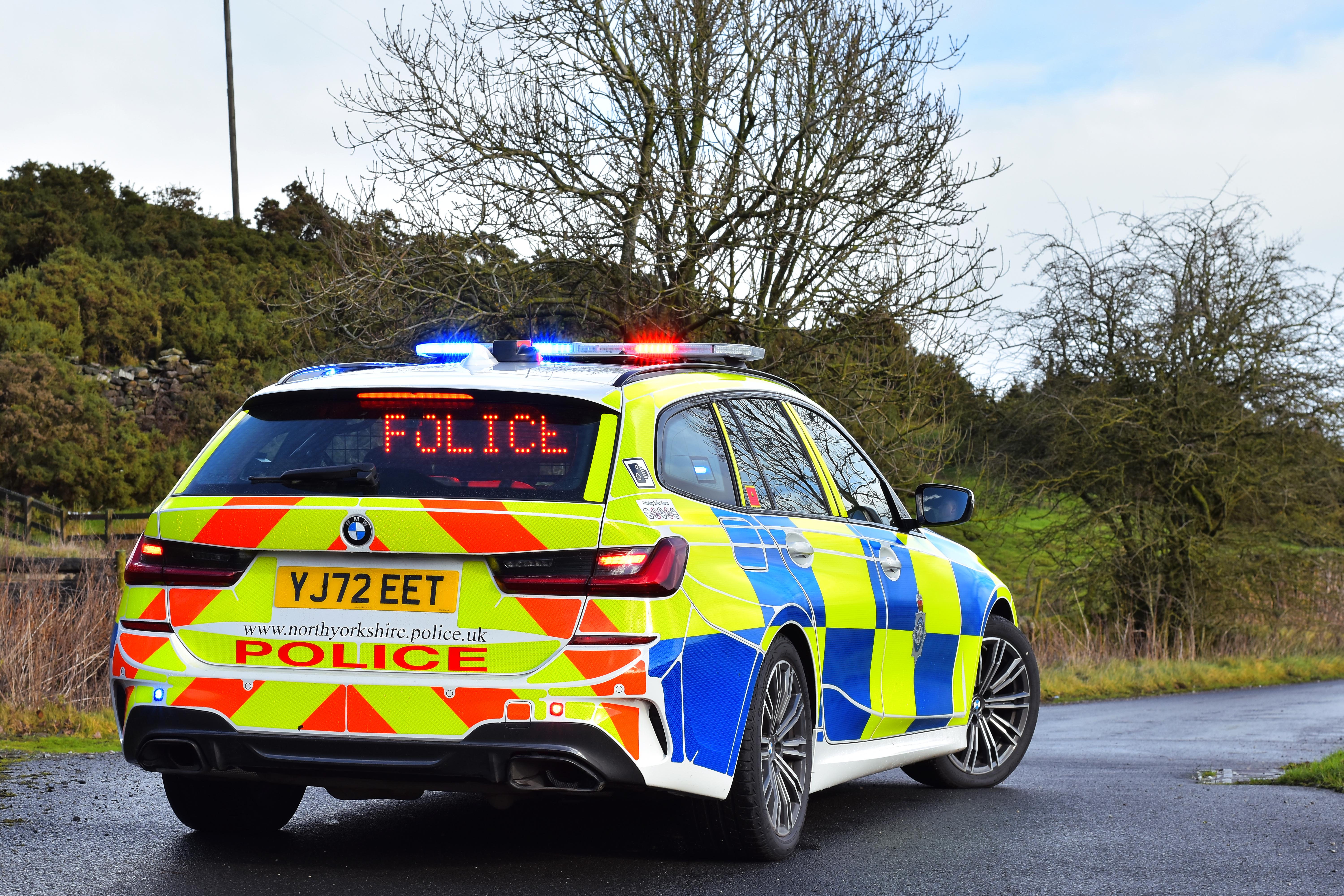 Police car on rural road