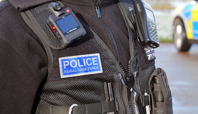 police uniform and badge rural task force