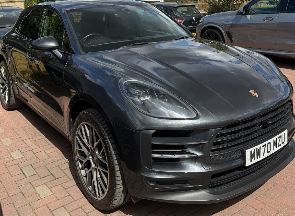 dark grey Porsche Macan